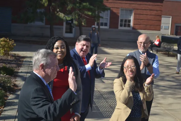 Senator Durbin, Nikita Richards, Governor Pritzker, Sharon Chung and State Senator David Koehler rally ISU on October 22.
