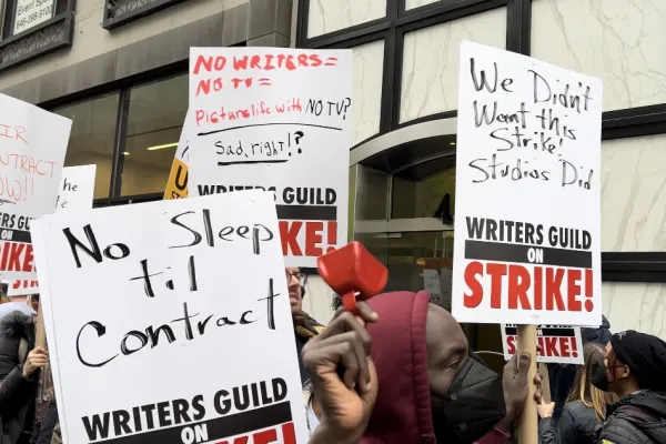 Photo of signs at WGA East picket line