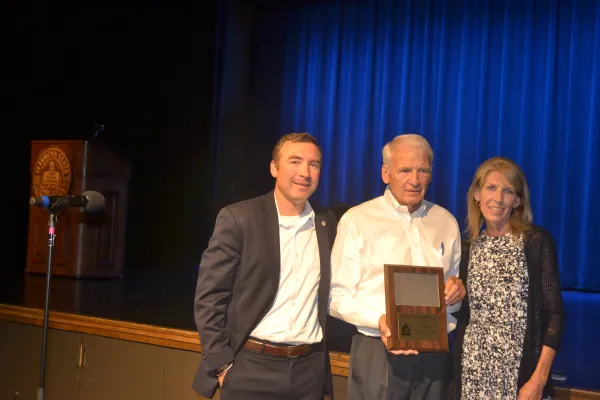 John Penn was named a McLean County Museum of History "History Maker" on June 18, 2024. Shown here with grandson Tim Ryan and daughter Shawn Eiker.