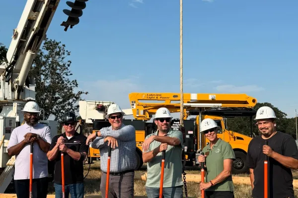 Representatives from the community participate in the ground-breaking ceremony