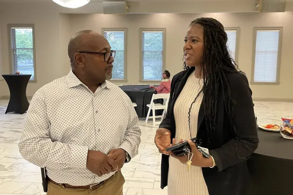 A mand and a woman talking