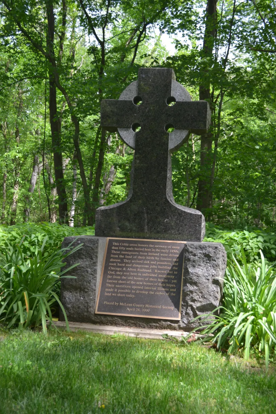 The Irish Rail Workers monument in Funk's Grove commemorates a mass grave of immigrant workers building the railroad into Bloomington in 1853.