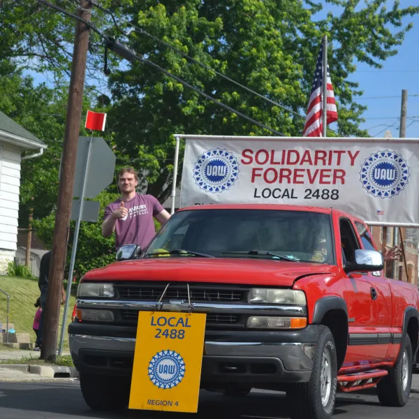 United Auto Workers retirees from Local 2488 participated in the 2023 Bloomington Memorial Day Parade.  2488 represented workers at the Mitsubishi Automotive plant.
